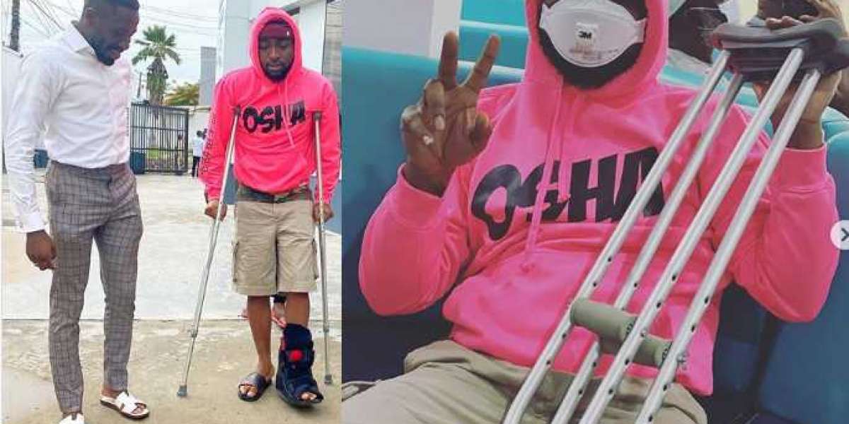 Davido fractures his leg, now using crutches